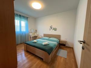Postel nebo postele na pokoji v ubytování "DeeZee" Apartment