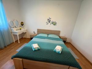 Postel nebo postele na pokoji v ubytování "DeeZee" Apartment
