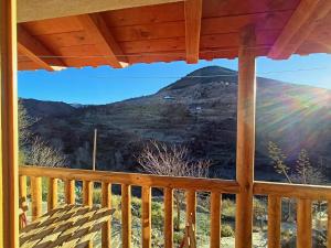 a view from a porch with a view of a mountain at Bellísima cueva acogedora "Casa Olivia" in Gor