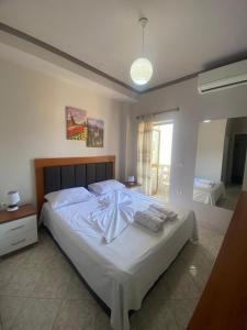 Postel nebo postele na pokoji v ubytování Hotel Boho