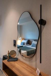 Posteľ alebo postele v izbe v ubytovaní Psaras Apartments