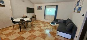 TV a/nebo společenská místnost v ubytování Apartment Jasminka