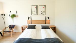 Postel nebo postele na pokoji v ubytování Hotel Vissenbjerg Storkro