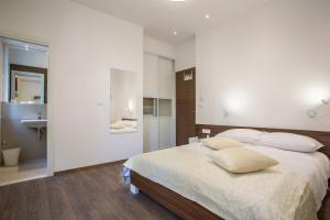Posteľ alebo postele v izbe v ubytovaní Luxury Accommodation Marino