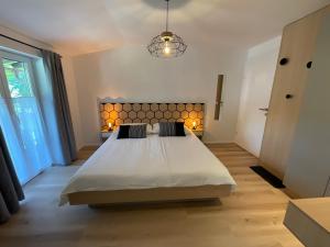 Łóżko lub łóżka w pokoju w obiekcie Seaways Apartments