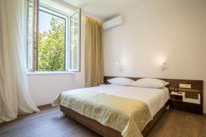 Posteľ alebo postele v izbe v ubytovaní Luxury Accommodation Marino