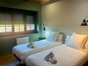 Posteľ alebo postele v izbe v ubytovaní Casa Bolboreta by Unusual Hotels