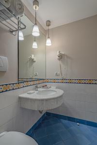 Koupelna v ubytování Hotel Capri