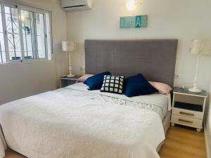 Postel nebo postele na pokoji v ubytování Pueblo Los Olivos, Riviera del Sol + 21 fotografií