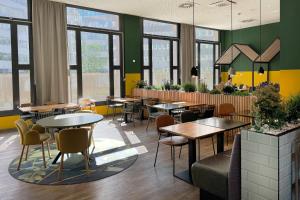 Area soggiorno di Holiday Inn - the niu, Dwarf Berlin Schöneberg by IHG