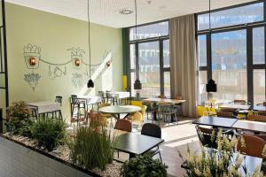Area soggiorno di Holiday Inn - the niu, Dwarf Berlin Schöneberg by IHG