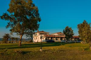 Fotografie z fotogalerie ubytování Sithonia Palace Apartments v destinaci Ormília + 25 fotografií