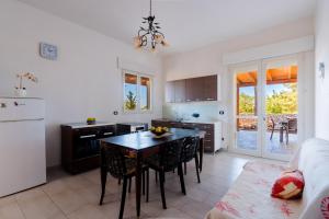 Kuchyň nebo kuchyňský kout v ubytování Villa Amelia by BarbarHouse + 17 fotografií