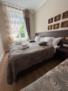 Voodi või voodid majutusasutuse Hotel Rudolf II Karlovy Vary toas