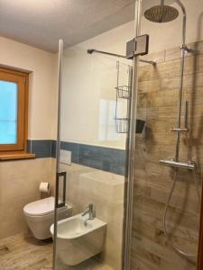 Kúpeľňa v ubytovaní Residence Raethia tra Bormio e Livigno