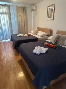 Postel nebo postele na pokoji v ubytování Apartments Vinea