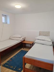 Postel nebo postele na pokoji v ubytování Casa Muresan