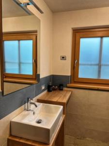 Kúpeľňa v ubytovaní Residence Raethia tra Bormio e Livigno