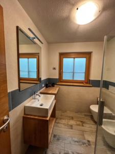 Kúpeľňa v ubytovaní Residence Raethia tra Bormio e Livigno + 37 fotografií