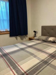 Posteľ alebo postele v izbe v ubytovaní Residence Raethia tra Bormio e Livigno