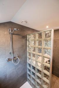 a shower room with a walk in wine cellar at Hidden jewel in Durbuy's forest in Durbuy