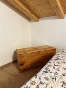 Posteľ alebo postele v izbe v ubytovaní Residence Raethia tra Bormio e Livigno