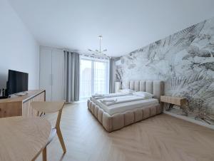 Turnau City Aparthotel客房内的一张或多张床位