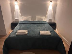 Uma cama ou camas num quarto em Valgemaja Majutus