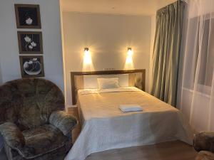 Uma cama ou camas num quarto em Valgemaja Majutus