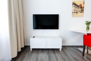 TV a/nebo společenská místnost v ubytování Hotel Vila Viola