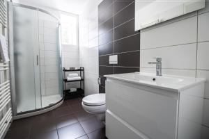 Koupelna v ubytování Hotel Vila Viola
