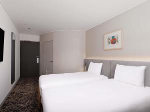 ibis Ambassador Seoul Insadong-Newly renovated in 2025にあるベッド