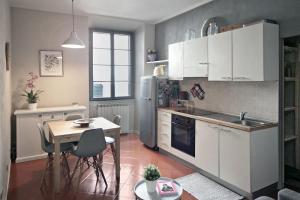 Η κουζίνα ή μικρή κουζίνα στο I Quattro Cantoni Apartment