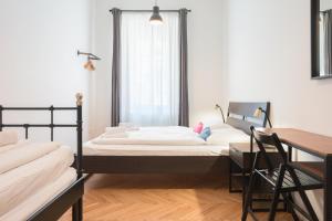 Postel nebo postele na pokoji v ubytování ATIK ROOMS