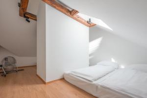 Postel nebo postele na pokoji v ubytování ATIK ROOMS