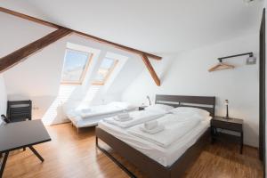 Postel nebo postele na pokoji v ubytování ATIK ROOMS