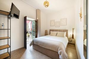 Ένα ή περισσότερα κρεβάτια σε δωμάτιο στο Villa 5