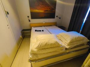Voodi või voodid majutusasutuse Guest House Tullgatan 24 toas
