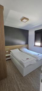 Postel nebo postele na pokoji v ubytování Delta Lake House 2