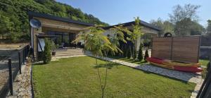 Zahrada ubytování Delta Lake House 2