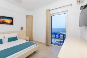 TV a/nebo společenská místnost v ubytování Hotel AGEL