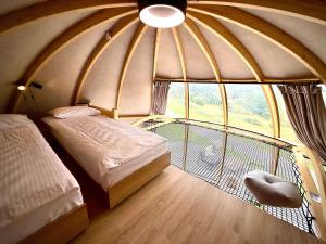 Postel nebo postele na pokoji v ubytování Wisła Glamping + 37 fotografií