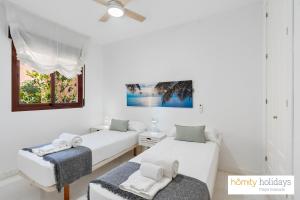 Ένα ή περισσότερα κρεβάτια σε δωμάτιο στο Homity Holidays - Playa Granada - Albatros +21 φωτογραφίες