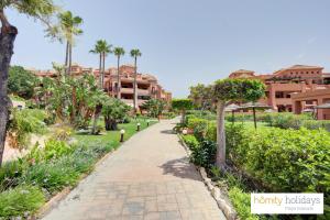 Κήπος έξω από το Homity Holidays - Playa Granada - Albatros