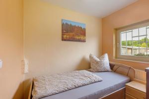 Postel nebo postele na pokoji v ubytování Ferienwohnung Eva