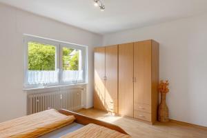 Postel nebo postele na pokoji v ubytování Ferienwohnung Eva