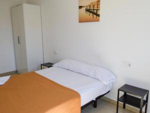Posteľ alebo postele v izbe v ubytovaní Apartamentos Benicarló Lowcost 3000