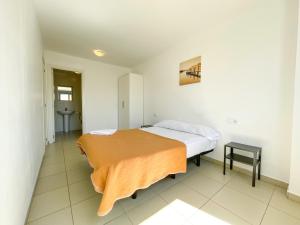 Posteľ alebo postele v izbe v ubytovaní Apartamentos Benicarló Lowcost 3000