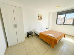 Posteľ alebo postele v izbe v ubytovaní Apartamentos Benicarló Lowcost 3000