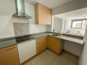 Kuchyňa alebo kuchynka v ubytovaní Apartamentos Benicarló Lowcost 3000